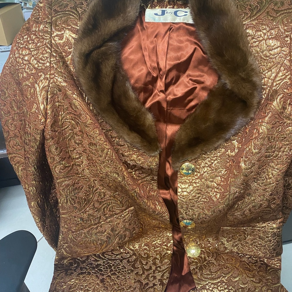 Beautiful J by C made in Italy with mink collar.